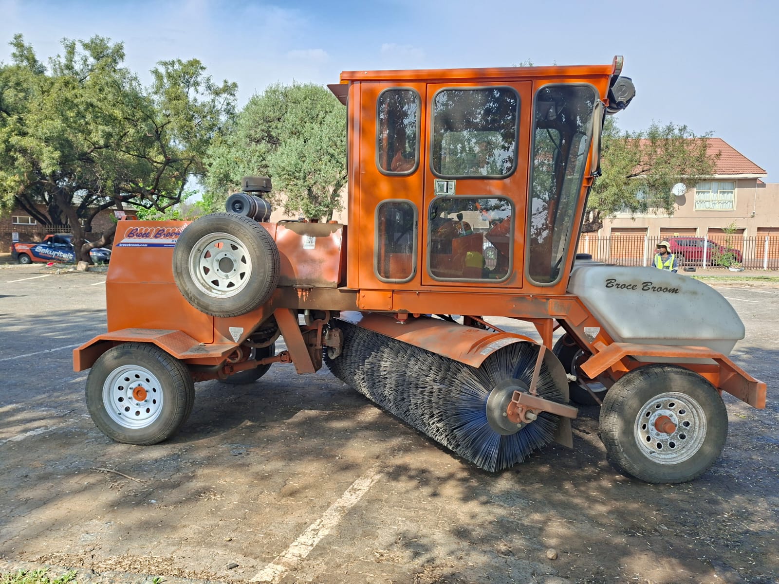 Orange Broce road broom