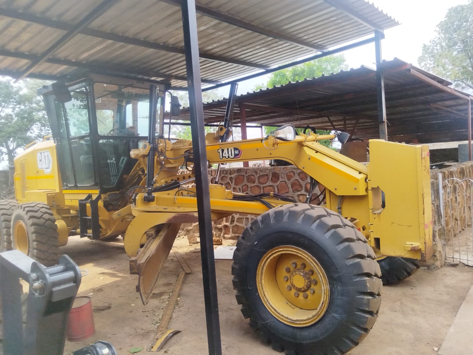 Motor grader on road construction site
